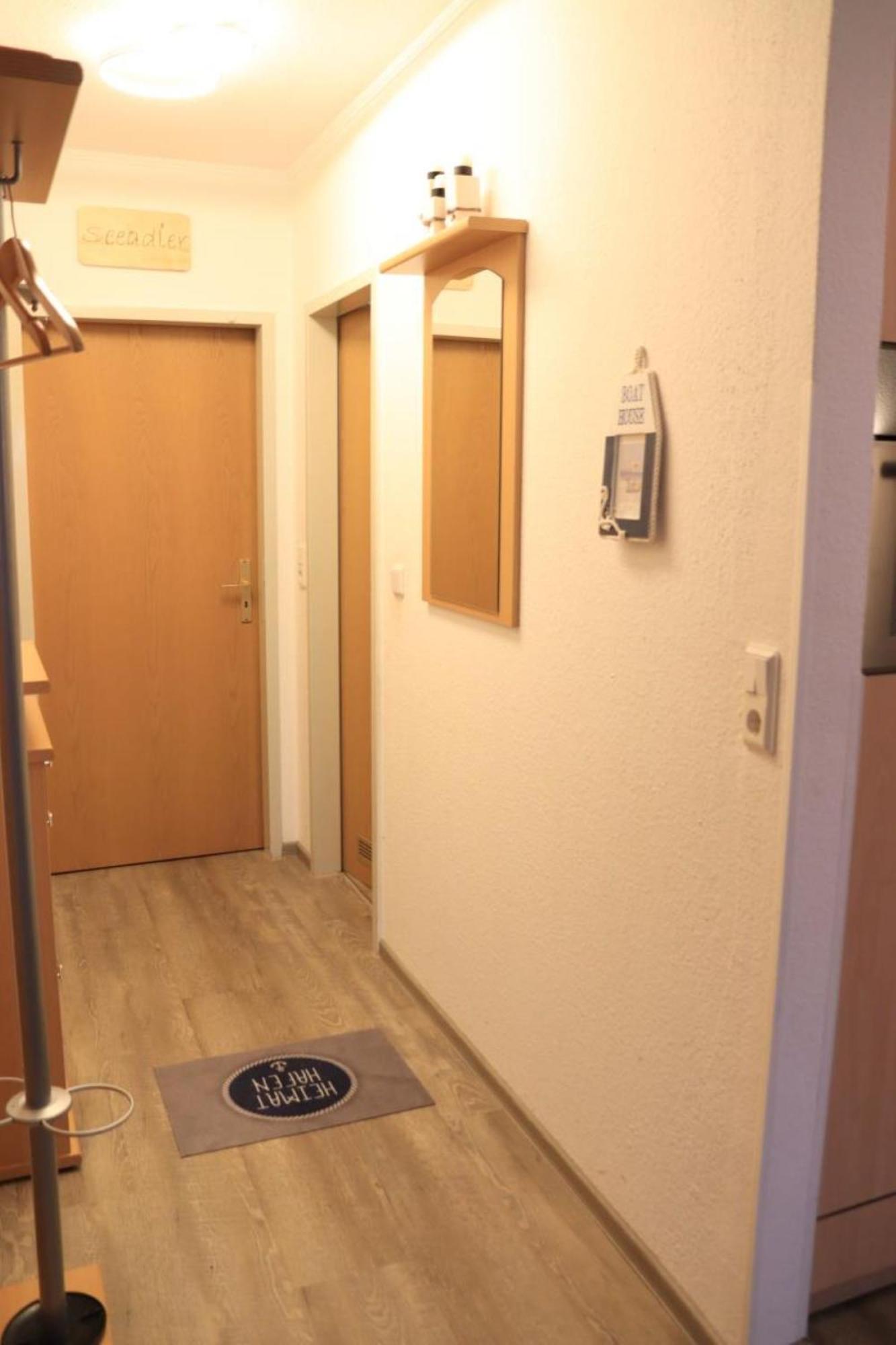 Ferienwohnung Mit Seeblick Und Schwimmbadnutzung In Cuxhaven Exterior photo